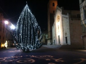 Verses of poetry projected on the Piazza